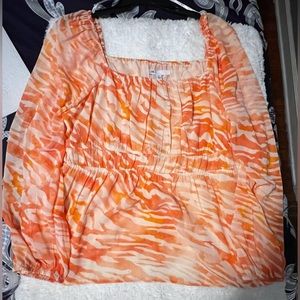 Orange and white dress top